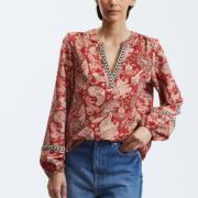 Blusa estampada con cuello de pico